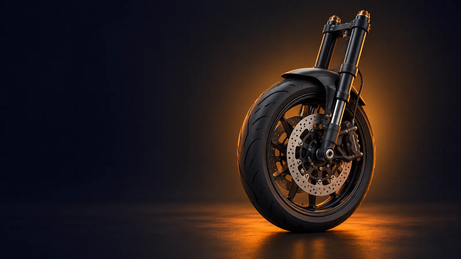 A motorcycle front wheel and fork lit by an orange glow