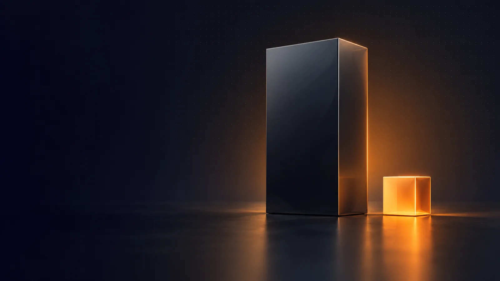 A tall dark block next to a small glowing orange cube